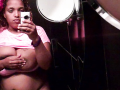 Chubby girl Diamond takes a couple of self-shots in the restroom