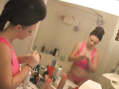 Sexy girlfriend puts on a makeup and teases with her sexy ass