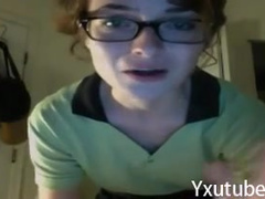 nerd looking slim teen strips on webcam