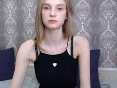 Barely legal Russian teen plays with her fine body