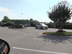 Blowjob in a car parking lot