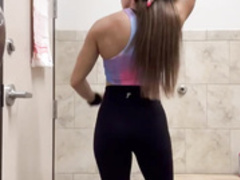 Fitness Model Flex Her Biceps