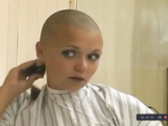 two beautiful ladies shaved smooth bald