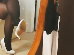 Blonde tease her black stocking legs 2