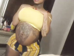 Pregnant CreamyExotica shows off ass and tits