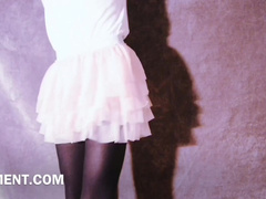 sissyformen blogger wearing black nylons and pink skirt