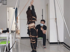 xy28-A Chinese girl wearing a black silk JK skirt and black stockings is tied up with ropes and tickled all over her body