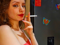 Smoking 2 Marlboro Reds in the kitchen, staining the cork filters with Red Lipstick ;) Muaa xx