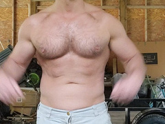 Muscle hunk pulls out his big dick