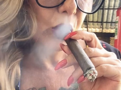 Available on PPV Smoking an entire cigar in thirteen minutes - Dangling, Nose exhales, Purple lipstick, Long red nails, Long blonde hair