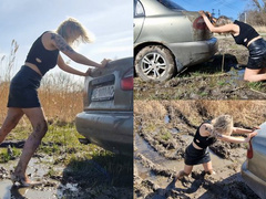 Anastasia desperately pushes the car out of the mud