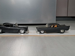 Two model hand built cars brutally crushed