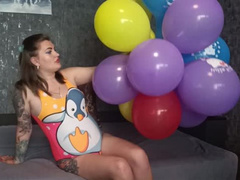 girl in swimsuit non pop balloons with helloo kitty