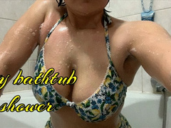 sexy shower in the bathtub with bikini suit
