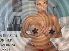 Eden Rubs oil on her MESMERIZING Boobs