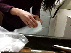 Sexy girl changing always pad in toilet pt.1