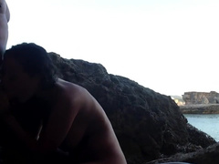 Couple having sex on the beach