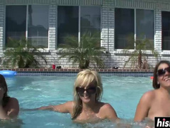 Lovely girls relax in the pool