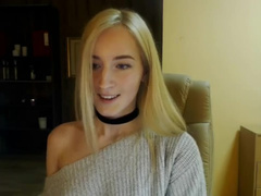 Cute girl plays with her huge boobs on cam